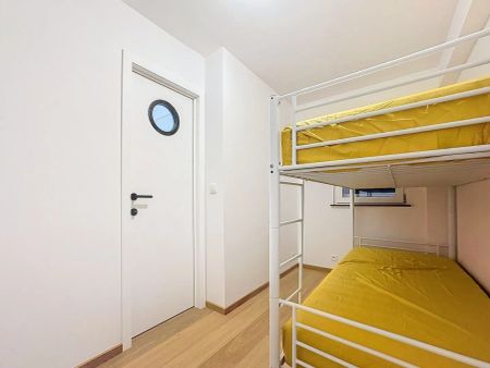 Gerenoveerd appartement met 1 slaapkamer op de zeedijk in Knokke-Heist - Photo 5