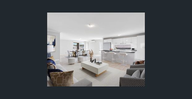 Spacious Family Living Awaits in This Stunning 4-Bedroom Home - Photo 1