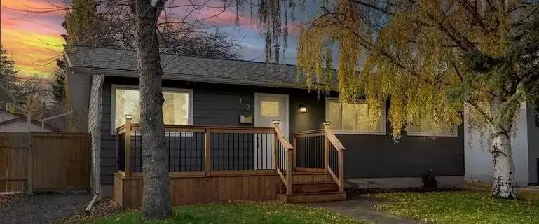 Renovated 2 Bedroom and 1 Bath Basement Suite with Large Windows: Legal Suite | 12 Hardisty Place Southwest, Calgary - Photo 1