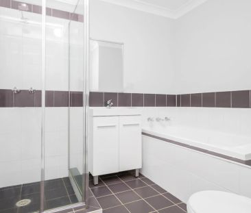 Immaculate and Convenient Two Bedroom Villa - Photo 4