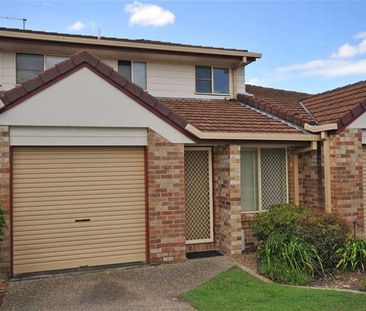 This comfortable 2-bedroom townhouse is in a perfect location - Photo 2