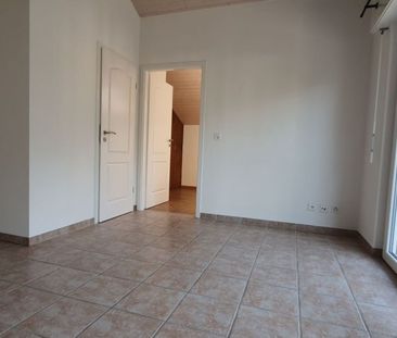 2.0 pces avec balcon et place de parc au centre du village - Photo 3