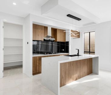 BRAND NEW LIGHT FILLED FAMILY HOME IN BEVERIDGE - Photo 5