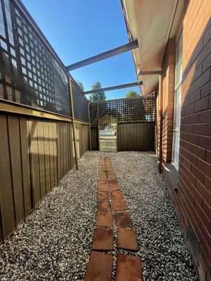 Modern Comfort and Easy Living with Gardener Included - Photo 1