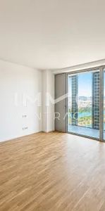 City-Studio im DC Tower 2 mit 10 m² Loggia und Fernblick - Photo 2