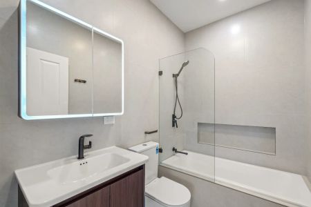 Immaculate Family Home - Freshly Renovated In Prime Location with Water Views - Photo 3