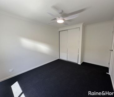 Modern Family Living in the Heart of Munno Para Downs - Photo 5