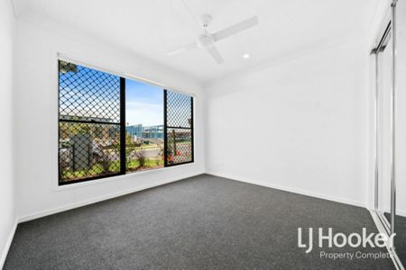 SLEEK & STYLISH NEAR NEW BUILD - GREAT SIZE BACKYARD! - Photo 2