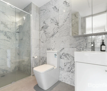 Modern Two-Bedroom Living with Balcony & Abundant Natural Light - Photo 5