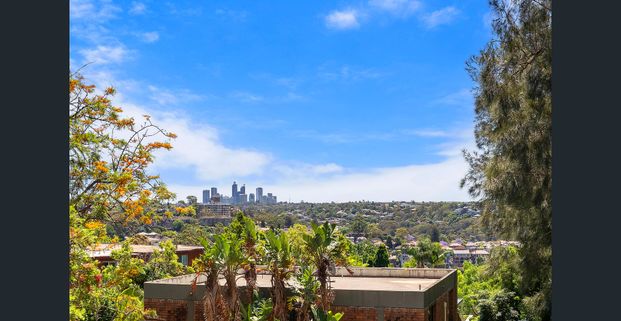 Light Filled North Facing Two Bedroom Apartment - Photo 1
