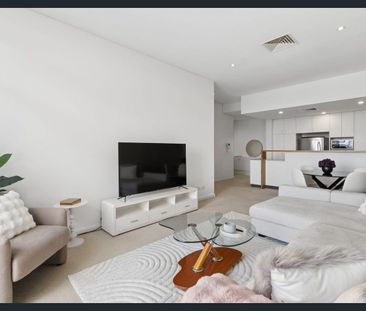 Top-Floor Sophistication - Fully Furnished 2-Bed 2-Bath 2-Park Luxury - Photo 3