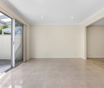 Spacious Three-Bedroom Townhouse With Multiple Living Areas - Photo 1