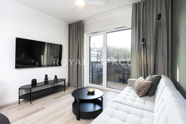 Eleganckie mieszkanie z 2 miejscami parkingowymi - Photo 1