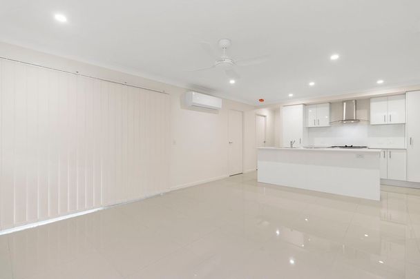 Large Family Home within the Covella Estate - Photo 1