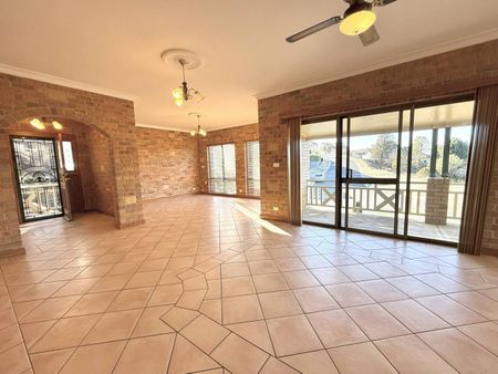 Spacious Family Home with Breathtaking Bushland Views and Flexible Living - Photo 4