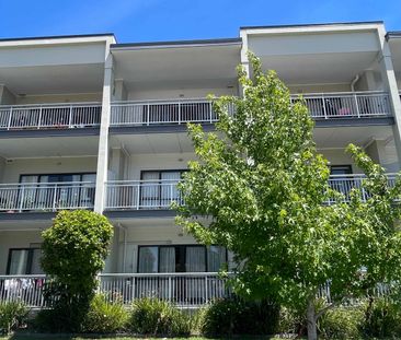 DESIRABLE NORTH FACING APARTMENT - Photo 1