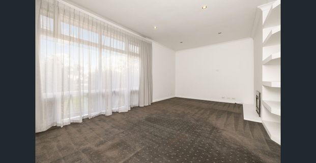 UNFURNISHED - Charming Solid-brick Home with Treetop Views - Photo 1