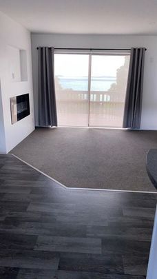 Charming 2BR Unit with Deck & A/C! - Photo 1