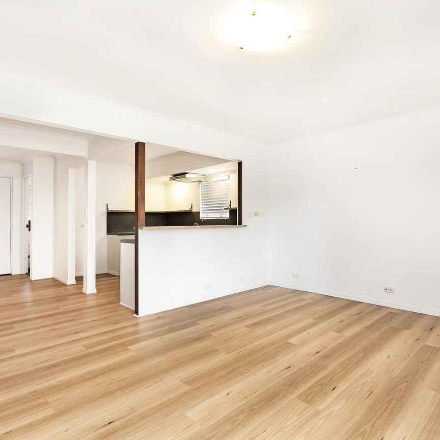 Peaceful, Updated Townhouse in a Leafy Setting - Photo 1