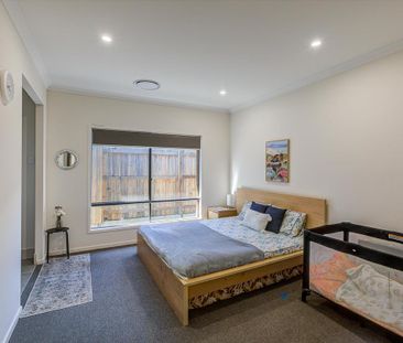 Spacious Family Home with Large Yard in Logan Reserve - Photo 5