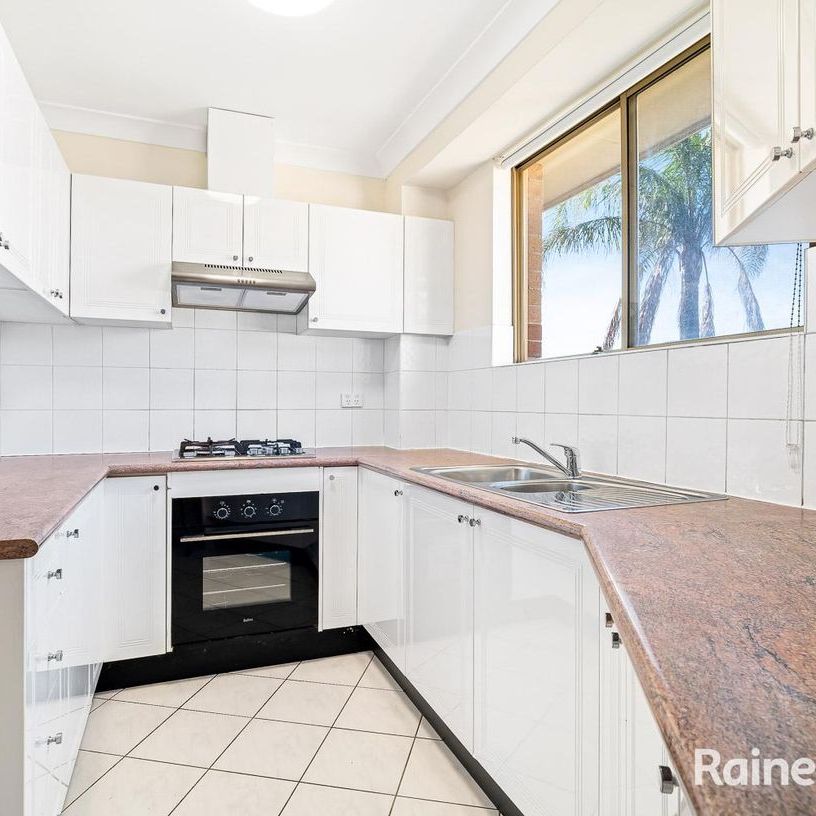 Renovated Top Floor Apartment with Space, Sun & Convenience - Photo 1
