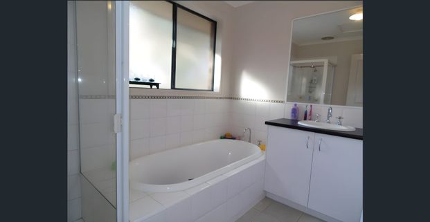 Comfort and Style: Your Sanctuary at 21 Cascades View, Yallambie - Photo 1