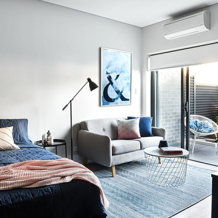 Stylish Studio Living with Courtyard Charm! - Photo 1