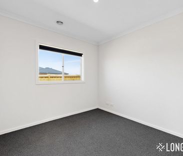 Four Bedroom Family Home with Modern Kitchen and Outdoor Entertaining - Photo 4