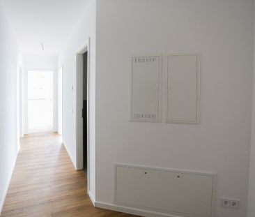 Dachgeschosswohnung mit großzügiger Terrasse - 3 Zimmer auf über 90... - Foto 4