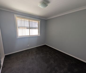 Comfortable Family Living with Entertainer's Appeal - Photo 5