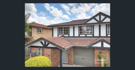 Comfort & Convenience Await: Charming 3-Bedroom Rental with Prime Location - Photo 4