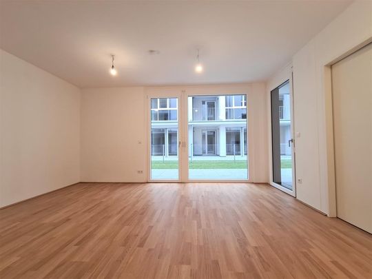40m² Außenfläche in Ruhelage! Top-moderne Gartenwohnung! - Foto 1