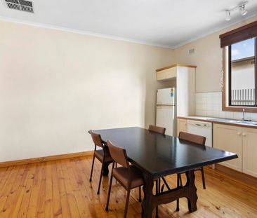 Spacious 3-Bedroom Home with Large Yard & Multiple Living Areas - Photo 2