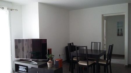 Location Appartement 3 pièces 64m² BOUGUENAIS 44340 - Photo 2