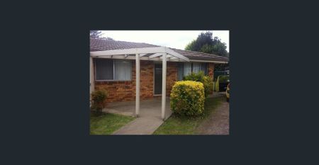 Brick 2-Bedroom Unit in Convenient Location - Photo 3