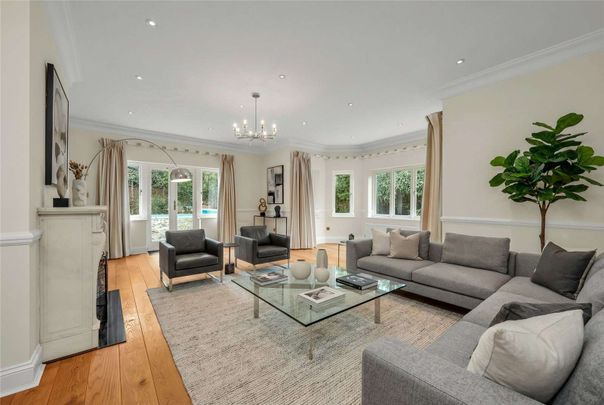 Situated in grounds of just over half an acre and located in one of Esher's most sought after private roads close to High Street. - Photo 1