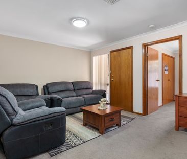 Neat, Tidy & Centrally Located – The Perfect Low-Maintenance Home - Photo 1