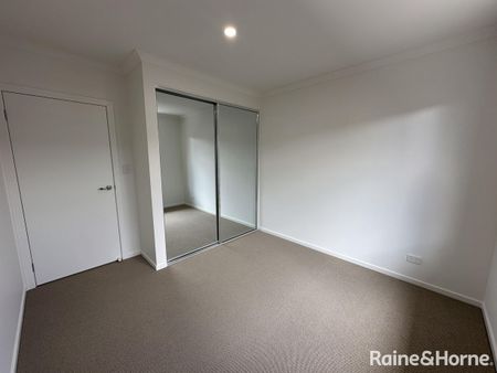 Brand New 4-Bedroom, 2-Living Family Home in Munno Para Downs - Photo 4