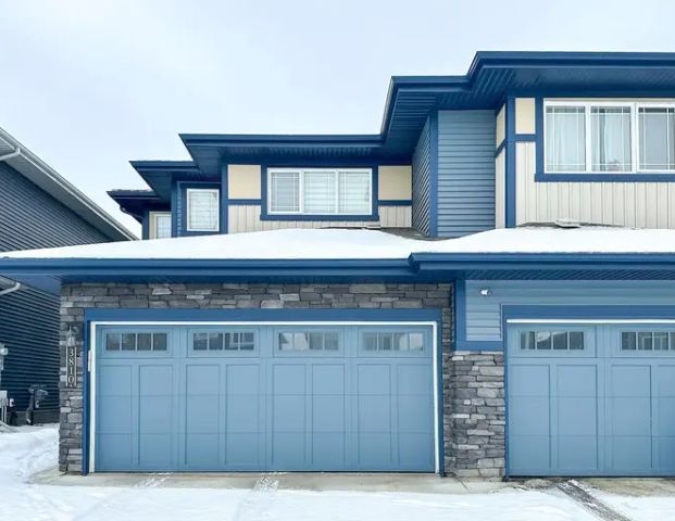 3 bedrooms double attached garage duplex with finished basement in Walker lake | 3810 Weidle Crescent Southwest, Edmonton - Photo 1