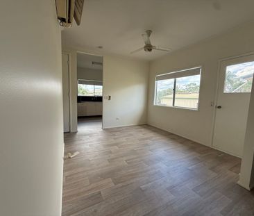 Neat and tidy High set with fresh pain and flooring - Photo 3