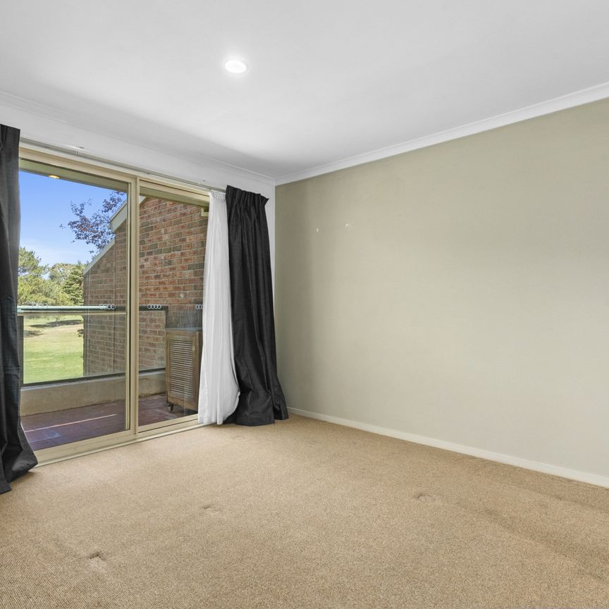 Spacious townhouse living with modern comfort and resort-style amenities - Photo 1