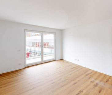 2-Zimmer-Neubauwohnung mit besonderem Schnitt! EBK und Balkon/Terra... - Foto 1