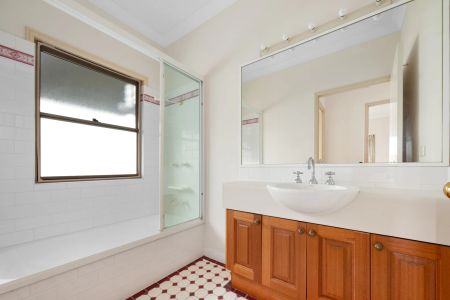 Charming Queenslander with Spacious Backyard & Leafy Entertaining - Photo 5