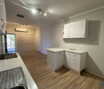 Modern property with a large fenced yard! - Photo 3