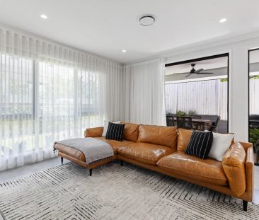 Beautifully designed, near new family home - Photo 1