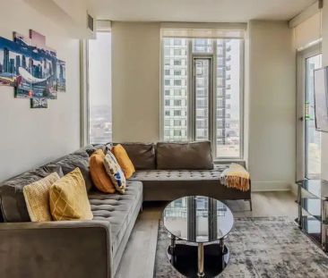 FULLY FURNISHED BEAUTIFUL VIEW IN A 1 BEDROOM PLUS DEN DOWNTOWN CAL... - Photo 1