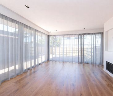 STYLISH TOWNHOUSE WITH MODERN FLAIR - Photo 1