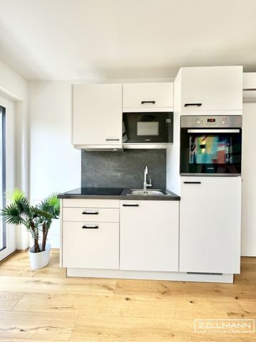 Stilvolle Dachgeschossresidenz mit hochwertiger Ausstattung und urbanem Wohnkomfort | ZELLMANN IMMOBILIEN - Photo 4