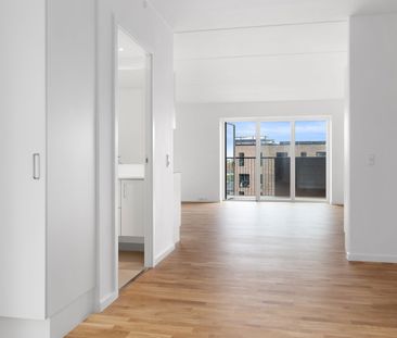 Skøn 2-værelses lejlighed med stor altan i et moderne byggeri - Photo 2