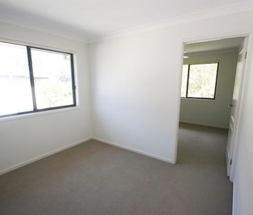 Comfortable Four-Bedroom Home with a Fully Fenced Yard - Photo 4